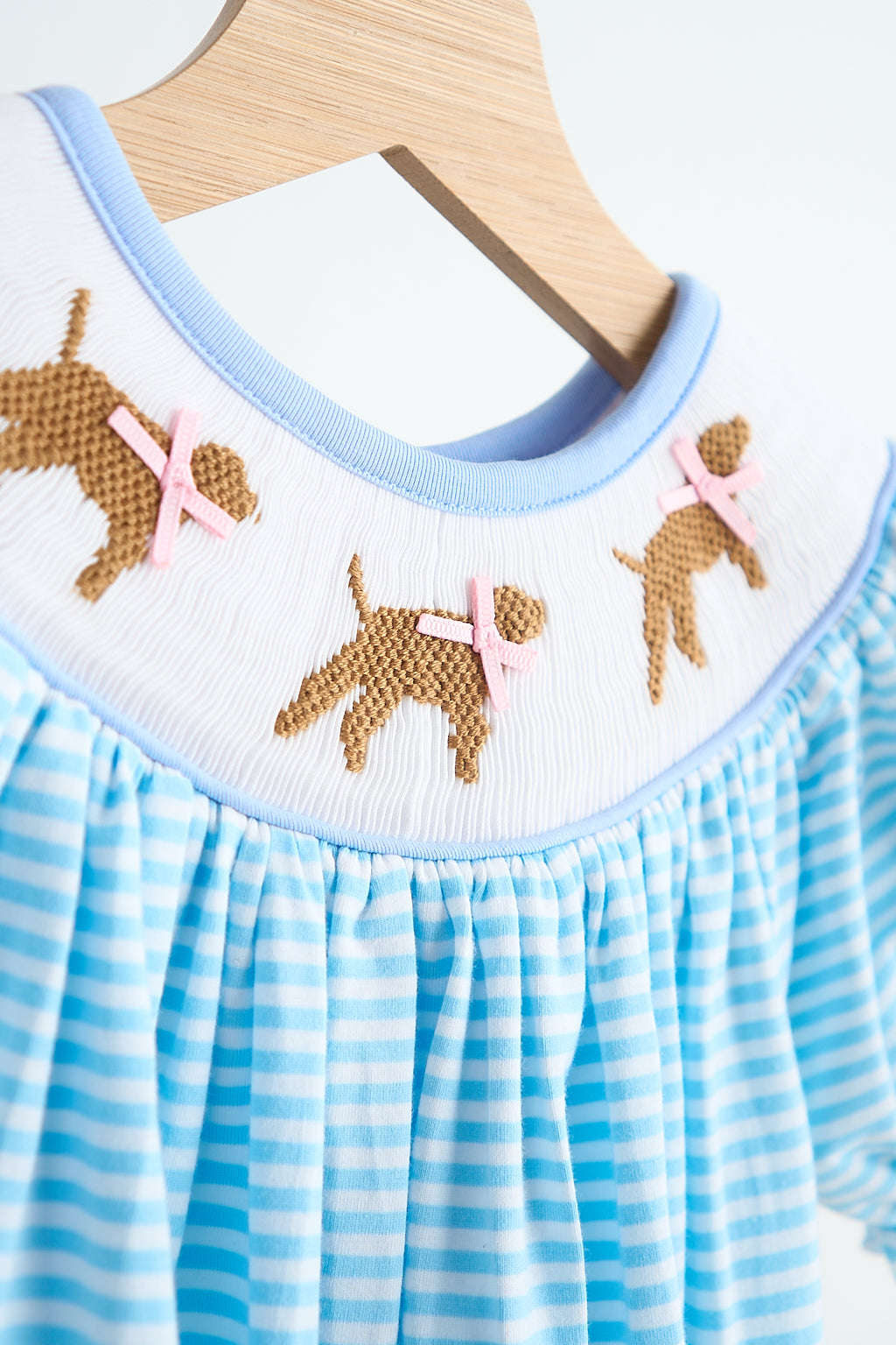 *Blue puppy hand smocked girl romper